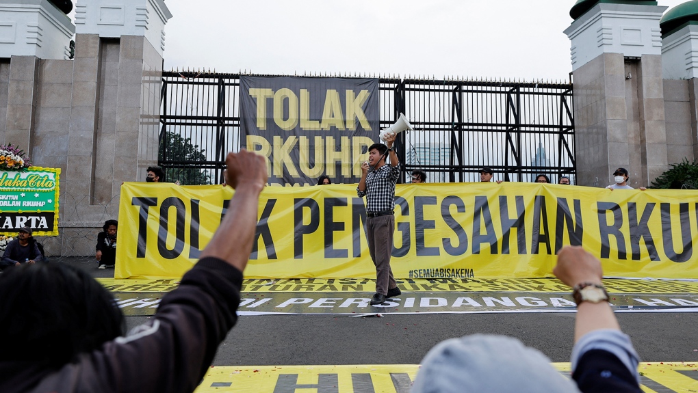 Indonesia passes criminal code banning sex outside marriage